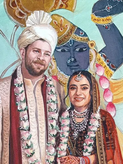A close-up on the faces of the couple in the Pichwai-style painting. The groom's expression and the bride's gentle smile are the heart of the portrait.