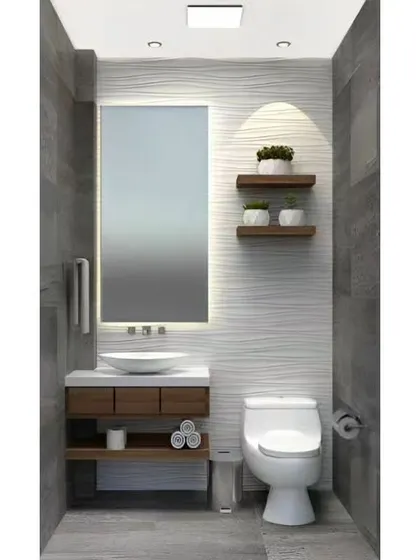 A compact and modern powder room design. The space features a floating wood vanity, a backlit mirror, and a textured accent wall, proving that small spaces can be stylish.