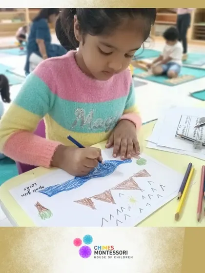 A child carefully draws and colors, demonstrating the focus and creativity that art activities nurture.