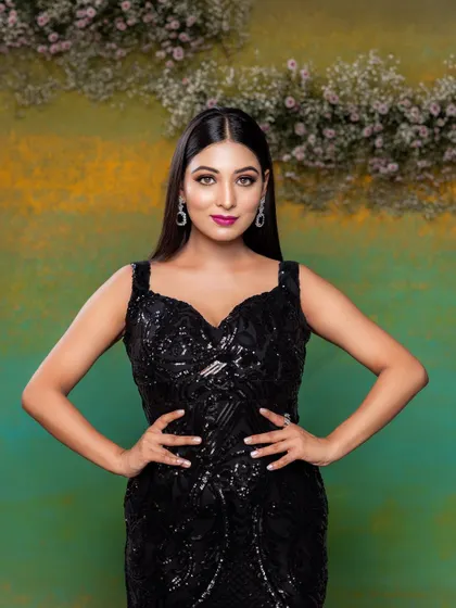 A powerful and confident pose from a creative shoot. The makeup is bold and striking, designed to make a statement.
