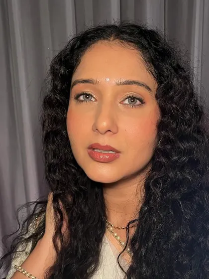 A close-up of this beautiful, natural look. The focus is on creating a smooth, glowing skin texture that looks flawless both in person and on camera.