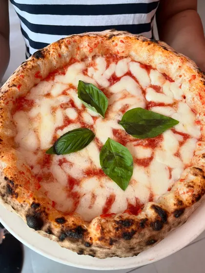 Our classic Margherita, held up for a beauty shot. It's a favourite for a reason.