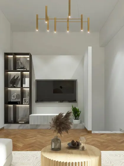The entertainment section of the family room, featuring a wall-mounted TV and a sleek, glass-front display cabinet for media and decor.