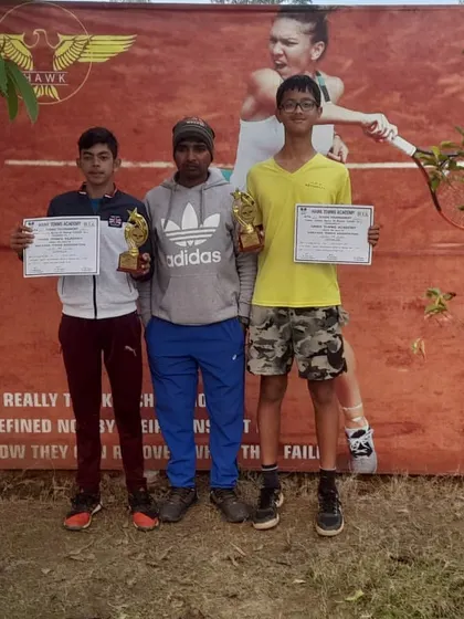 Riddhiman Ojha and his doubles partner after securing another title at the AITA CS7 event in Rohtak.