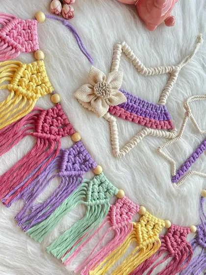 Another look at the vibrant macrame bunting and star decor. I use wooden beads to add a natural, rustic element to the colorful knotted flags.