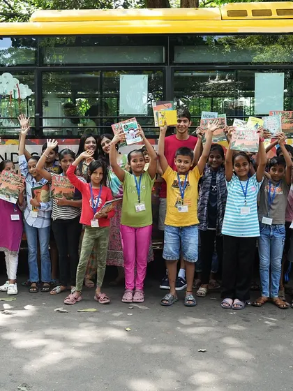 Waving goodbye after a successful book reading and music session. It's only just the beginning for these young learners.