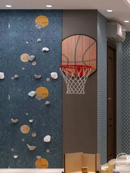 A fun and functional kid's room with a rock-climbing wall and a basketball hoop. We believe in creating spaces that encourage play and reflect a child's personality.