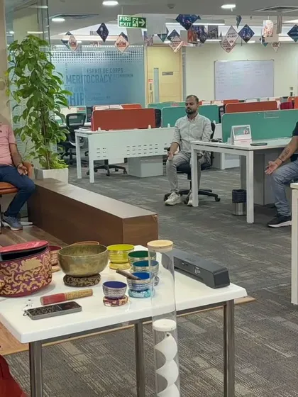 A desk yoga and meditation session at MagicBricks for International Yoga Day. Even without yoga mats, we can use chairs and simple movements to release tension and find stillness in the office.