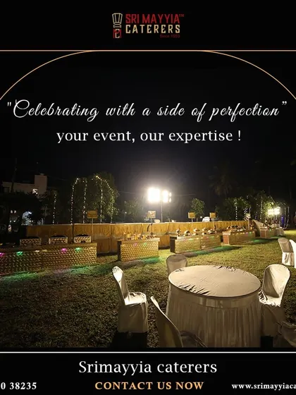 An evening view of our outdoor buffet line, elegantly lit to create a warm and inviting atmosphere for guests to enjoy their meal.