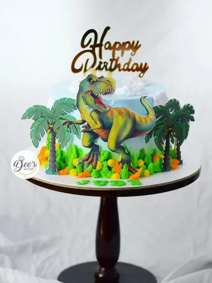 This dinosaur cake features a more realistic T-Rex against a prehistoric landscape, perfect for a kid who loves Jurassic Park.