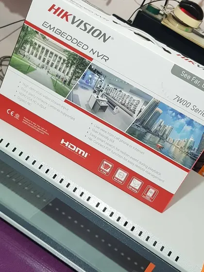 Another angle of the Hikvision NVR and rack, part of a professional setup.