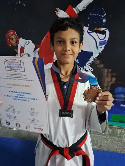 A sub-junior gold medalist from the 4th Aryan's Cup Open National Taekwondo Championship 2022.