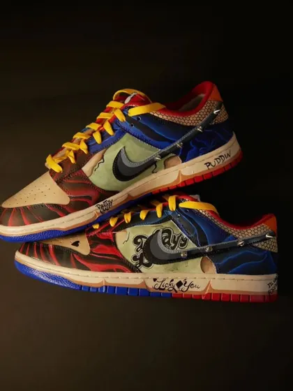 This Harley Quinn inspired Nike Dunk was one of the most challenging and rewarding pairs I've ever made. It's packed with details from her tattoos and outfit, including punk-style spikes. This is for anyone who loves a bold, gothic vibe.