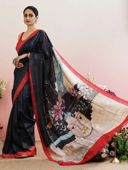 The full view of the abstract face print saree, a bold and artistic statement.