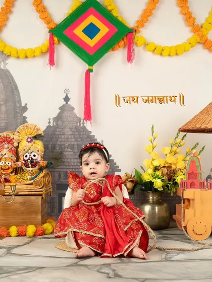 A little girl celebrating Rath Yatra in a beautiful red traditional dress.