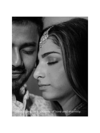 "Embarking on a journey of love and eternity." This artistic black and white close-up captures the peaceful and profound love shared between the couple.