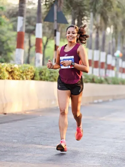 Finding my rhythm during a road run. My coaching helps you develop a pace strategy that feels strong and sustainable, whether it's a training run or a full marathon.