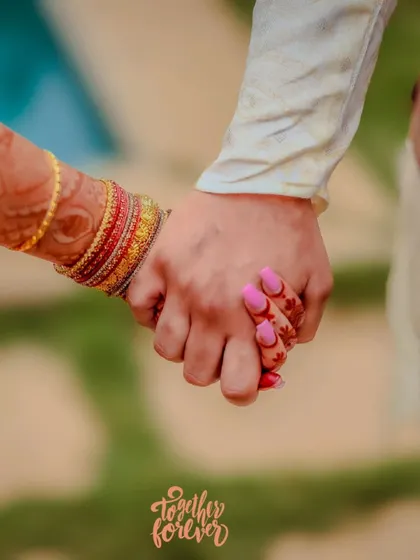 A close-up shot of the couple holding hands, with the words "together forever". This image focuses on a simple, powerful symbol of their commitment and love.