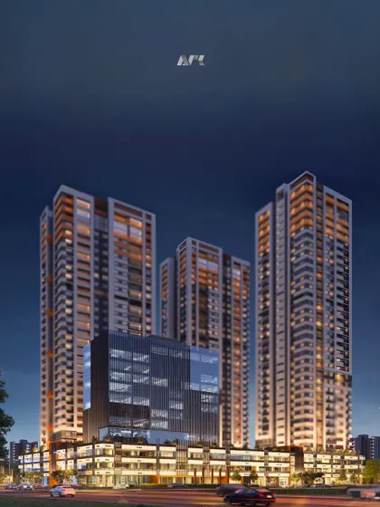 A nighttime render of the Holiday Inn, Ahmedabad. The design features multiple towers for hospitality and commercial use, creating a vibrant, large-scale urban hub.