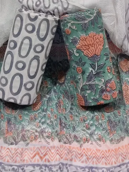 This subtle and sophisticated green and grey block print set is a great choice for office or daily wear.