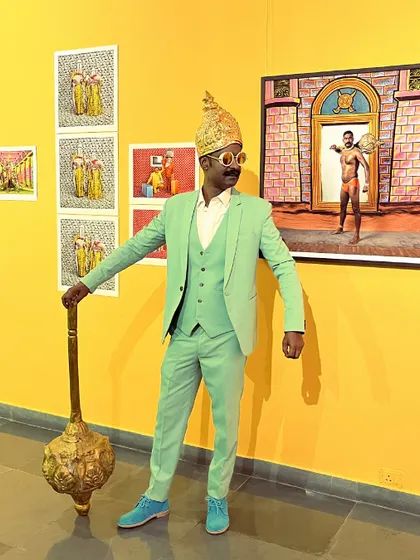 Artist Cop Shiva stands beside his work at the preview of his solo exhibition, 'No Longer A Memory'. My role is not just to sell art, but to support and develop the careers of the artists I represent, helping them bring their vision to life.