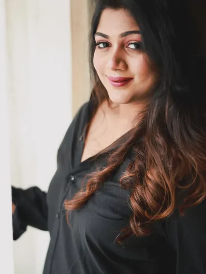 Duplicate of 54. A candid-style portrait that shows off the soft, romantic feel of this hair and makeup combination. It's glamorous yet feels natural and approachable.