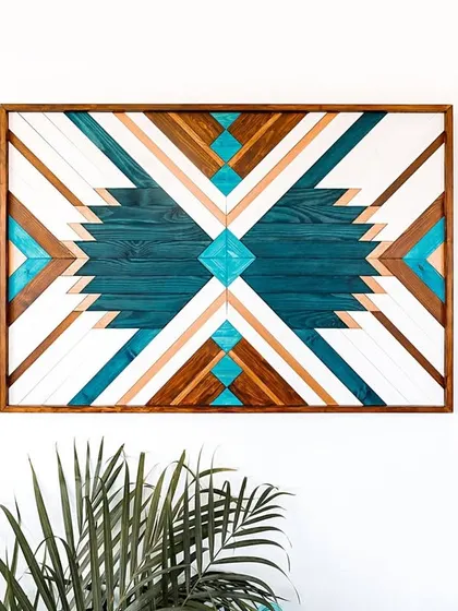 This image shows the large geometric art piece next to a smaller, complementary piece, illustrating how you can create a gallery wall with our collection.