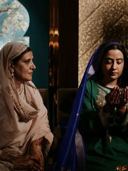 A moment of prayer during the Kashmiri Nikah ceremony, captured with a focus on the emotional and spiritual atmosphere.