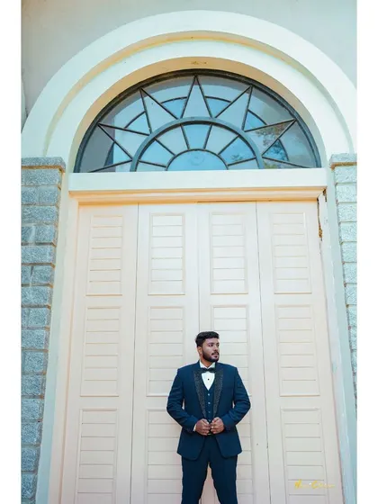 A solo portrait of the groom looking sharp and ready for the big day. I make sure to capture the groom's style and personality too.