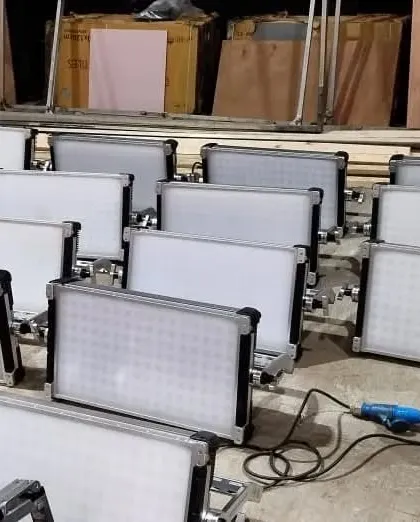 A collection of Arri SkyPanel S60-C units being prepped for a shoot. These panels are an industry workhorse, known for their beautiful color rendering and soft output.