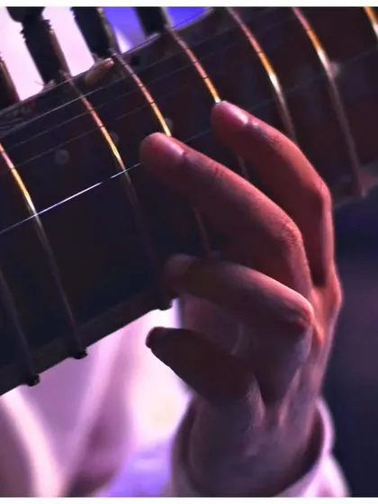A detailed shot of my hand on the sitar strings during the Depot48 performance.