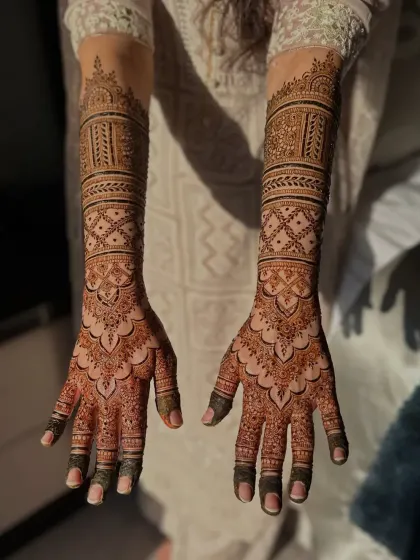 A full view of the intricate bridal design, showing the beautiful symmetry and detail.