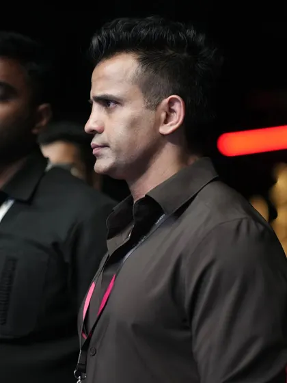 A profile shot of me, focused on the task at hand during a fight night.