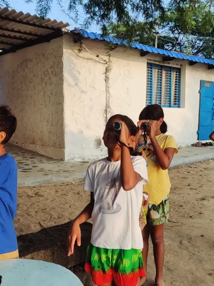 Armed with binoculars, our young ornithologists spot migratory birds like Pallas's gulls and bar-headed geese, learning about their incredible journeys and the importance of coastal habitats.