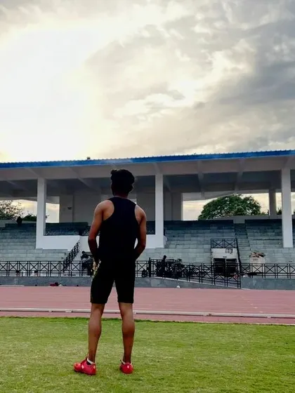 Taking a moment to look over the track at the stadium. This is my field of work, where I help athletes turn their potential into performance.