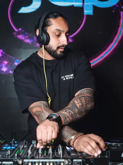 A close-up shot of me mixing on the Pioneer DJ console. I use top-of-the-line equipment to deliver a flawless musical experience.