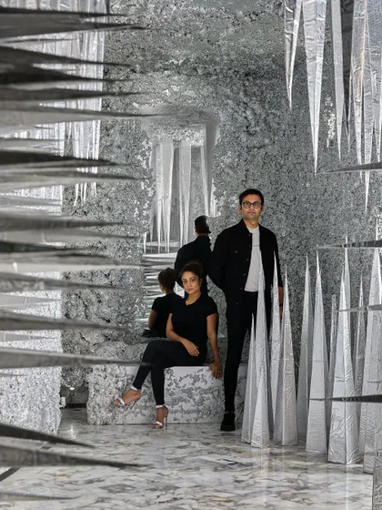 A portrait of us within the 'Palate Cleanser'. This installation embodies our love for creating spaces that challenge perception and tell a story through form, material, and sensory engagement.