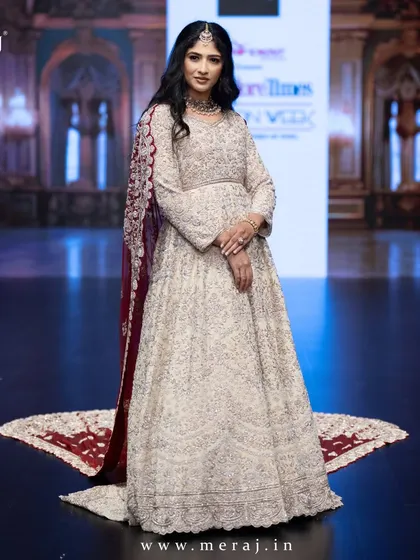 The showstopper tail gown, a tribute to opulence and couture perfection, as seen on the runway at Bangalore Times Fashion Week.