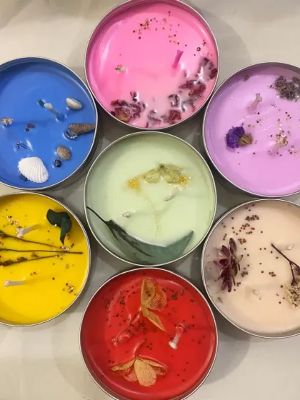 These are my 7 Chakra tealights. Each one is a different color and topped with botanicals to represent the seven energy centers, helping you find balance and alignment.