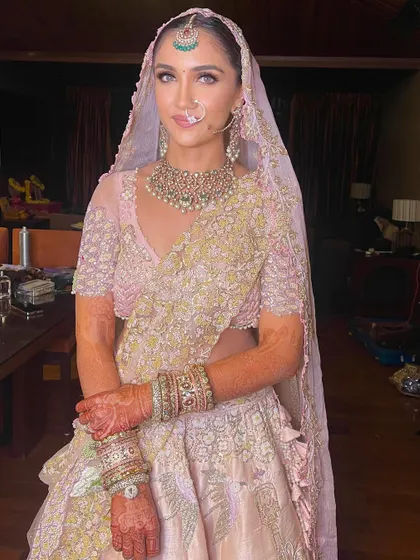 The complete look with the dupatta, showcasing the elegant hairstyle.