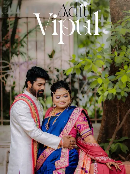 A beautifully styled portrait of the couple, framed by lush greenery, with elegant text overlay that makes it perfect for sharing.