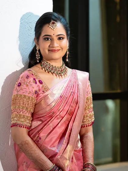 An elegant look for Vibha, celebrating her natural beauty with a soft, rosy glow and a radiant base.