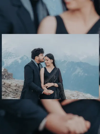 A close-up of the groom kissing the bride's forehead, with the snowy mountains in the background. This is a classic romantic shot that always tells a beautiful story.