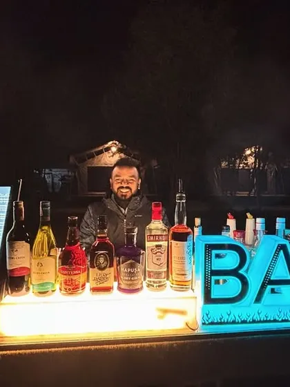Another angle of our professional bar setup for Volkswagen in Nubra Valley. The illuminated bar and menu stand out against the night sky, proving we can deliver a high-end bar service anywhere in the world.
