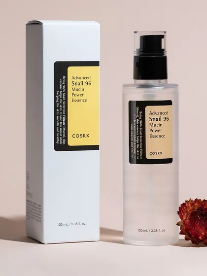 A classic, clean e-commerce shot for COSRX. This minimalist style, with soft lighting and simple propping, puts the focus entirely on the product and its packaging, meeting the standards for marketplace listings and brand websites.