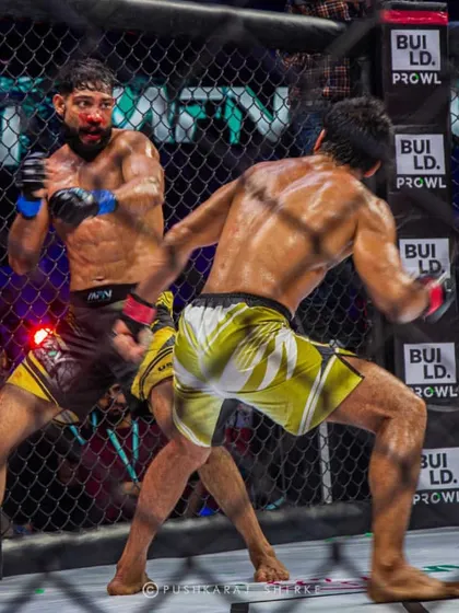 A bloodied but unbroken Sanjeet Budhwar continues to trade punches. This fight was a testament to the warrior spirit.