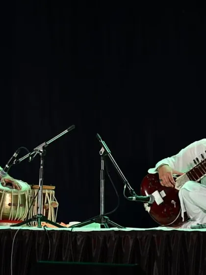 Performing a sitar and tabla duet at the centenary celebration in Aurangabad. The stage was set for a night of remembrance and musical offering.