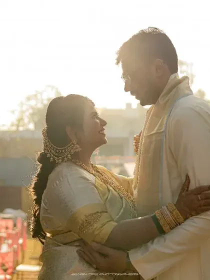 A silhouetted embrace against the warm glow of the sun. This artistic shot focuses on their connection, creating a feeling of intimacy and romance.