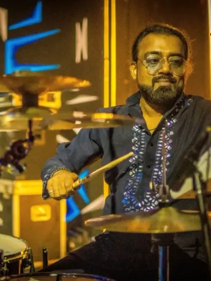 Our drummer smiling as he keeps the beat, enjoying the fantastic atmosphere at the JW Marriott.