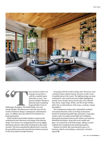 A look at the main living area from our feature in GoodHomes magazine. The space is designed with a subtle color palette of green and grey, with natural wood on the ceiling to add warmth. The layout is perfect for hosting large parties while maintaining a cozy atmosphere.